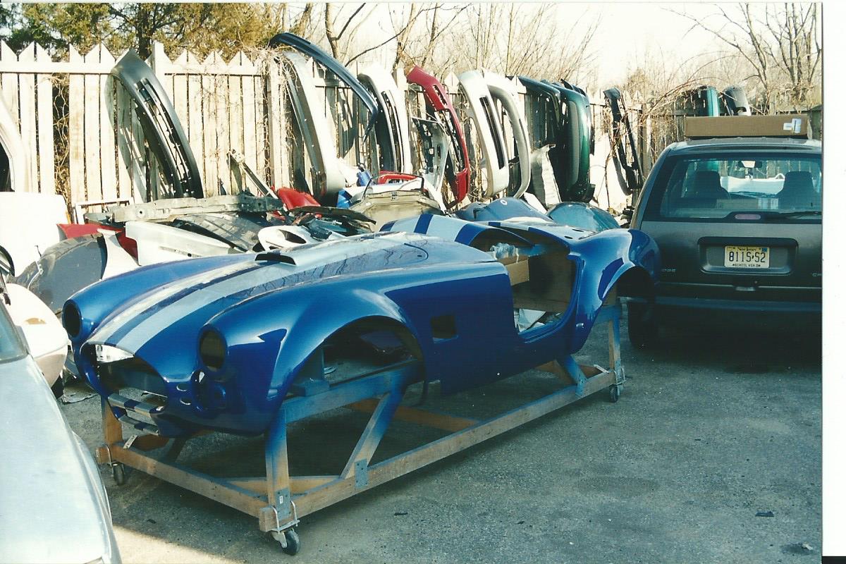 Cobra kit car painted on cart